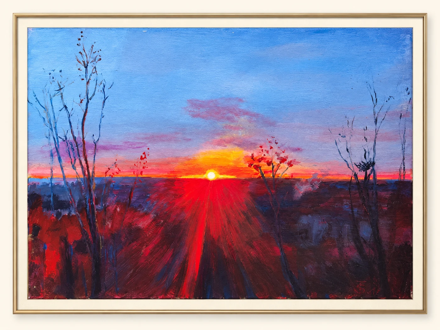 Gemälde eines Sonnenuntergangs in einem eleganten goldfarbenen Rahmen